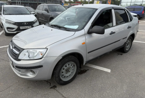 LADA Granta седан, 2014 года с пробегом 131 000 км