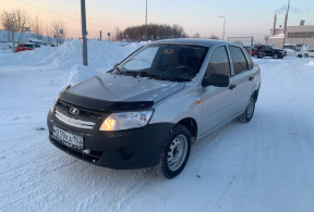 LADA Granta седан, 2013 года с пробегом 124 000 км